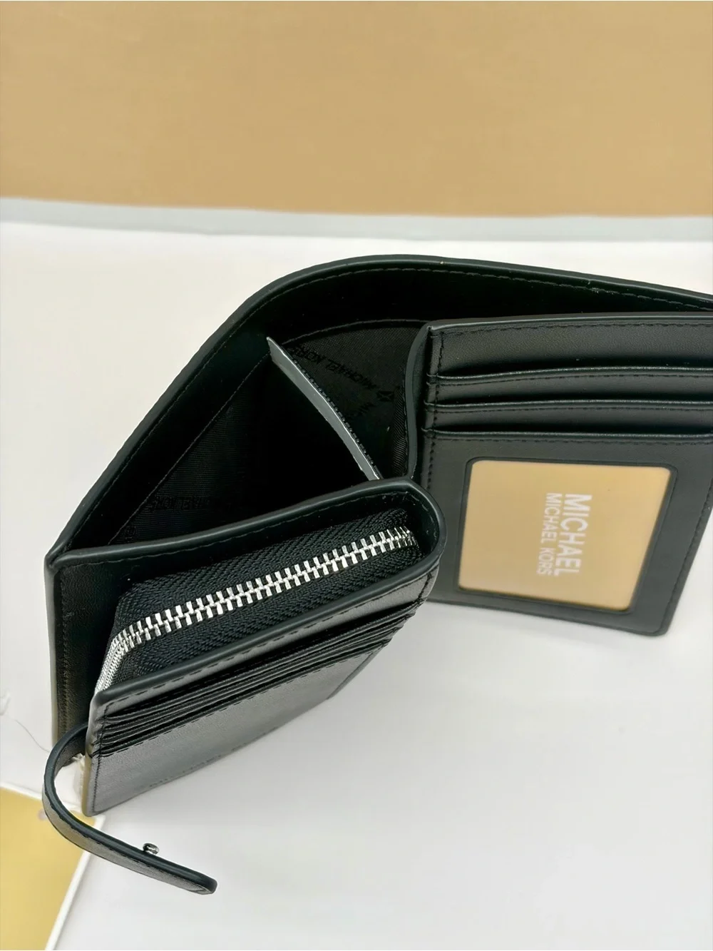 Michael Kors compact bi